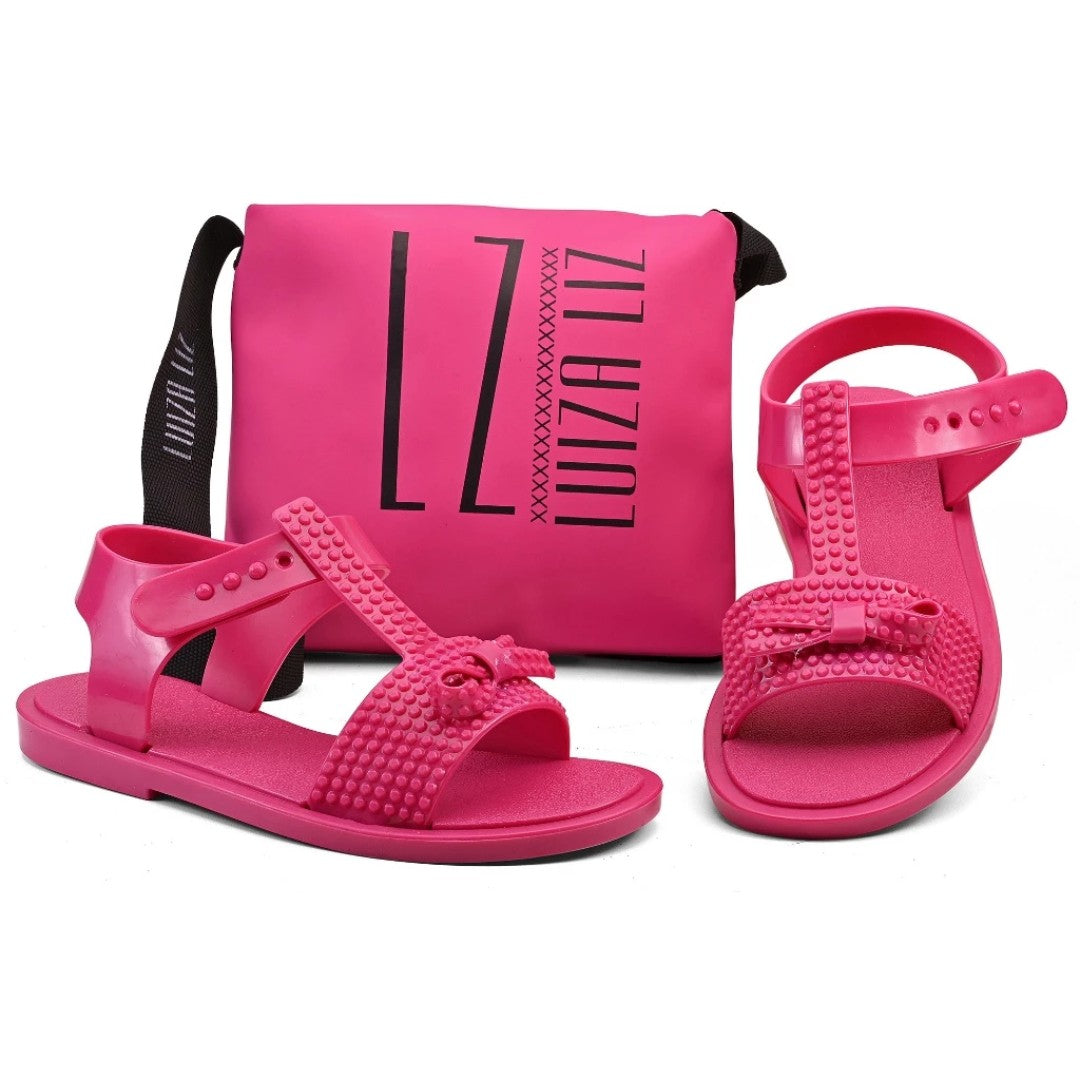 👧 Sandália LaçoCharm™ com Bolsa – O Toque de Doçura Que Encanta 🎀✨